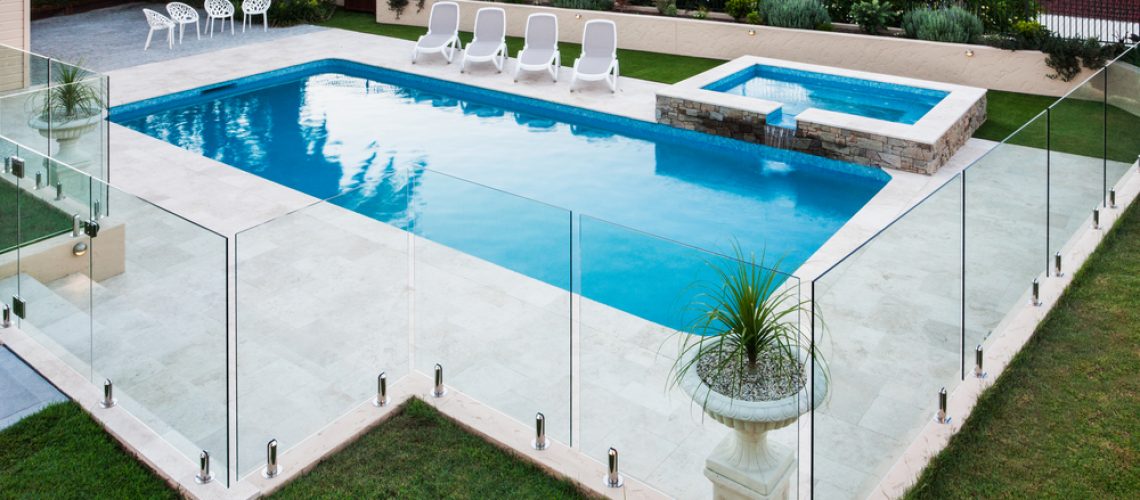 Pool with fence installation and maintenance